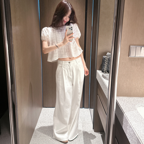 Kine white pin-tuck pants